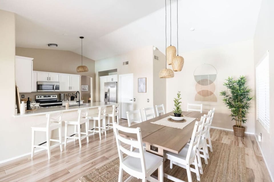 The open layout is perfect for entertaining. The kitchen is fully stocked with everything needed to cook amazing meals!