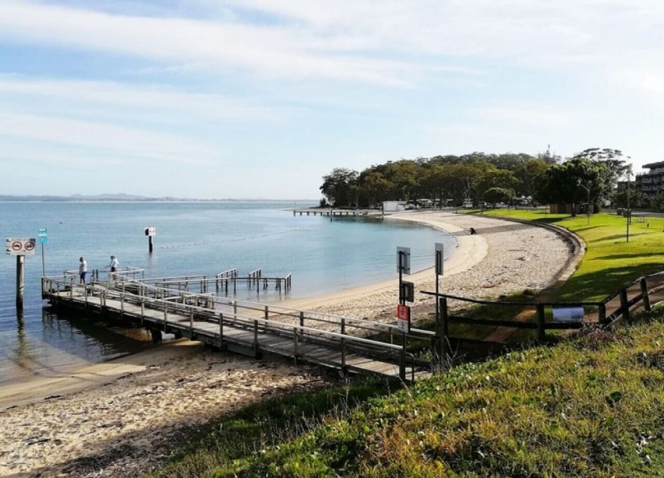 Little Beach at the end of the street. Crystal clear water. Safe swimming, fishing, snorkelling, cafes, restaurant