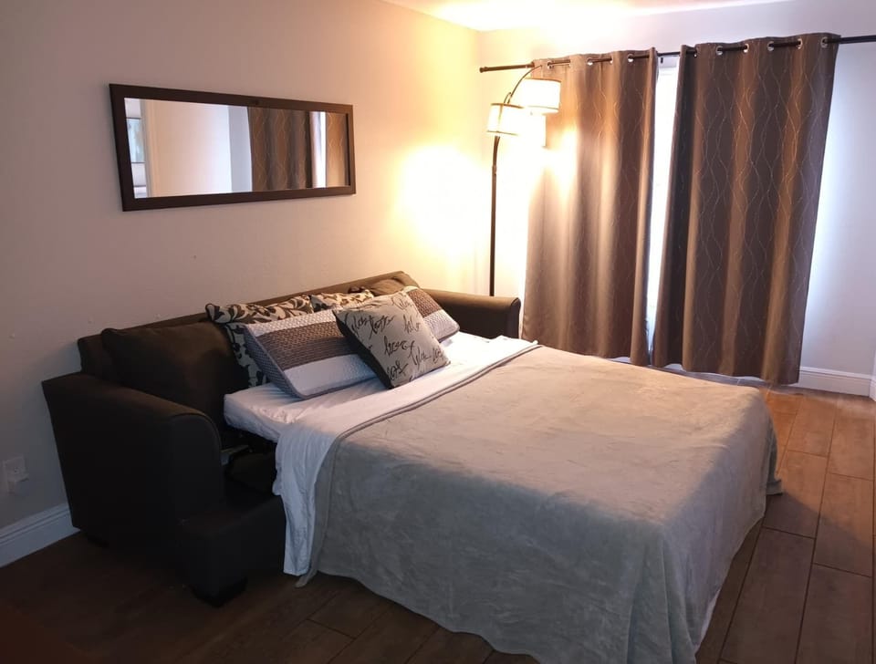 Cozy sofa bed and a new smart TV with all your favorite streaming apps.