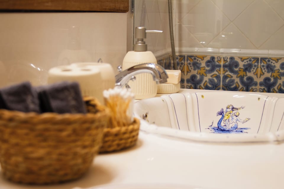 Romantic Studio Suite, Pool View | Bathroom | Towels, toilet paper