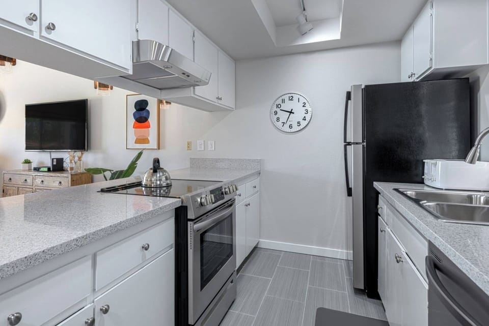 Updated kitchen with view into living room