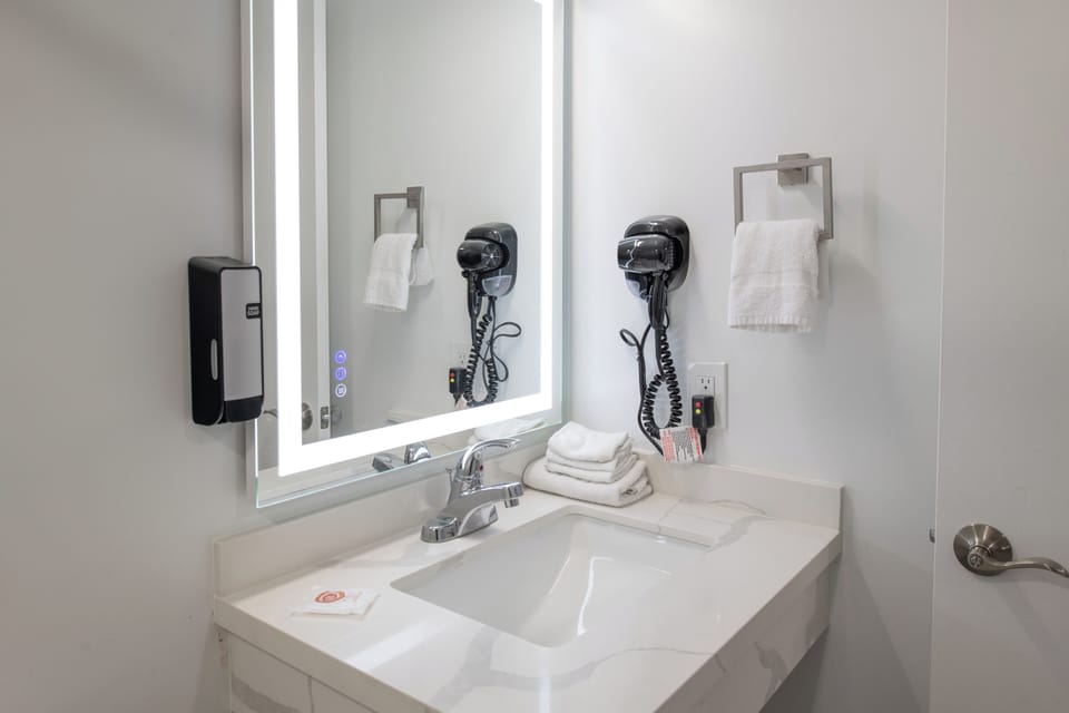 Hair dryer, towels, soap, shampoo