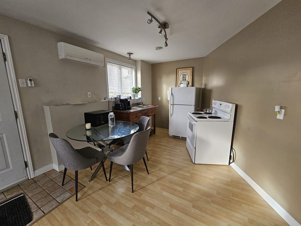 The kitchen is fully equipped with necessary amenities for a comfortable stay