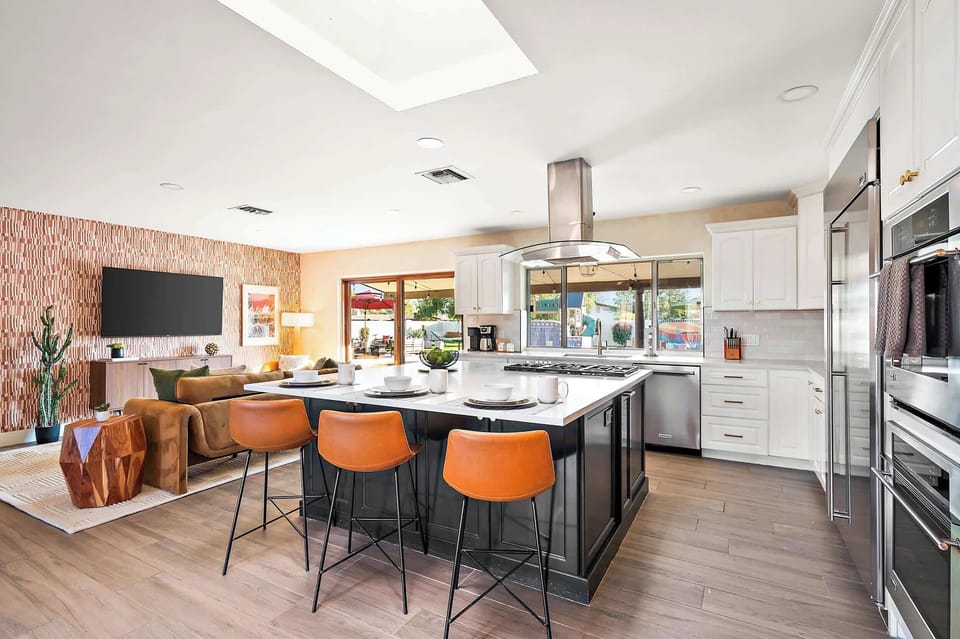 Seamless flow from the living room to the kitchen—perfect for socializing, cooking, and relaxing all in one open space! 