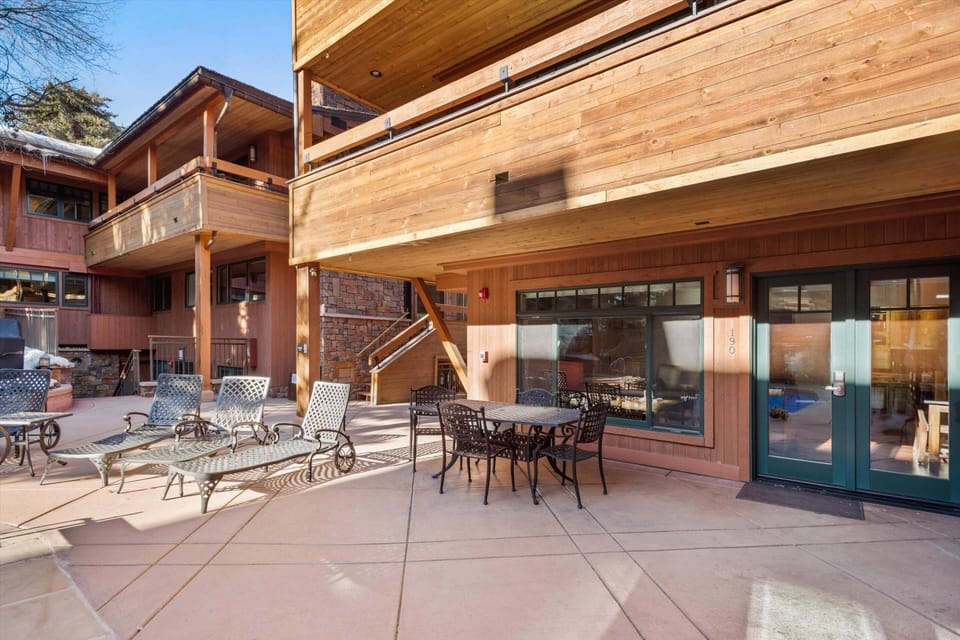 Step right outside your back door to this inviting deck area at the pool and hot tub.  A shared gas grill area is also available for your use.