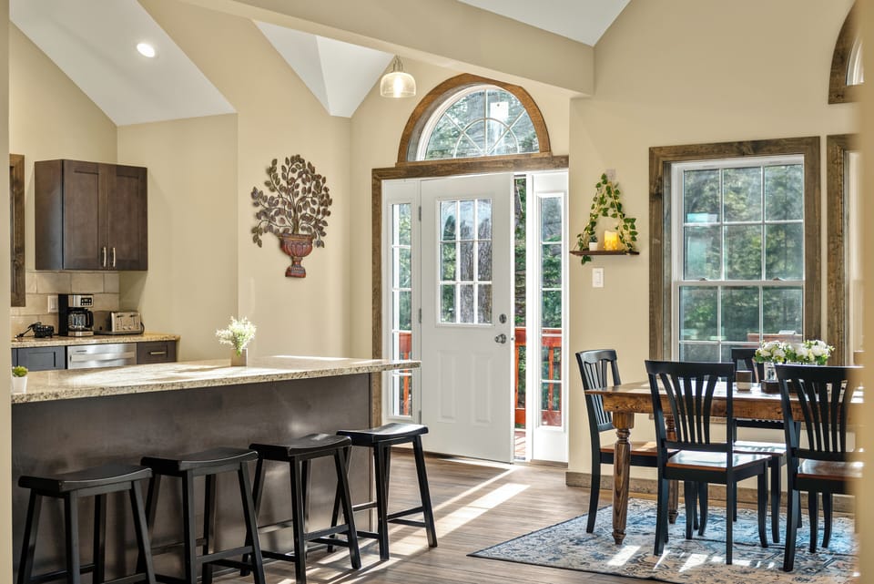 Outdoor access near the dining area and kitchen.