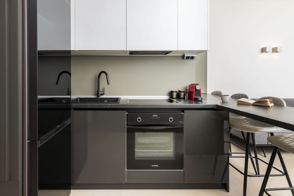 Apartment, Balcony, City View | Private kitchen | Espresso maker, coffee/tea maker, electric kettle, highchair