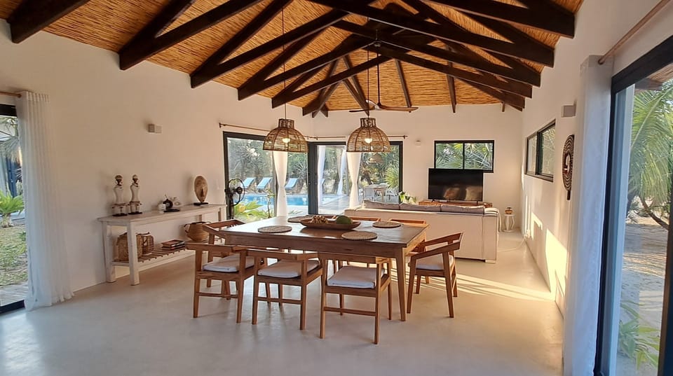 Luxury Villa, Private Pool, Beach View | Living area | Books