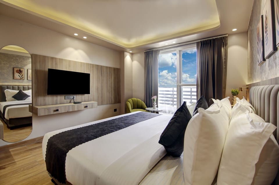 Superior Room Balcony with City View | In-room safe, desk, laptop workspace, soundproofing