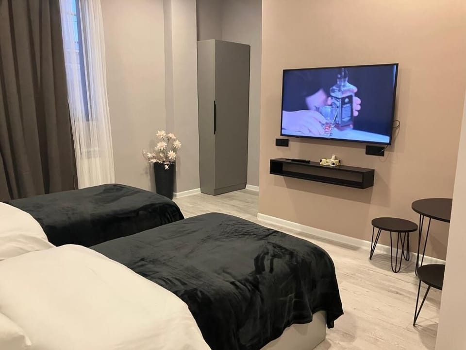 Standard Twin Room | Desk, laptop workspace, iron/ironing board, free WiFi