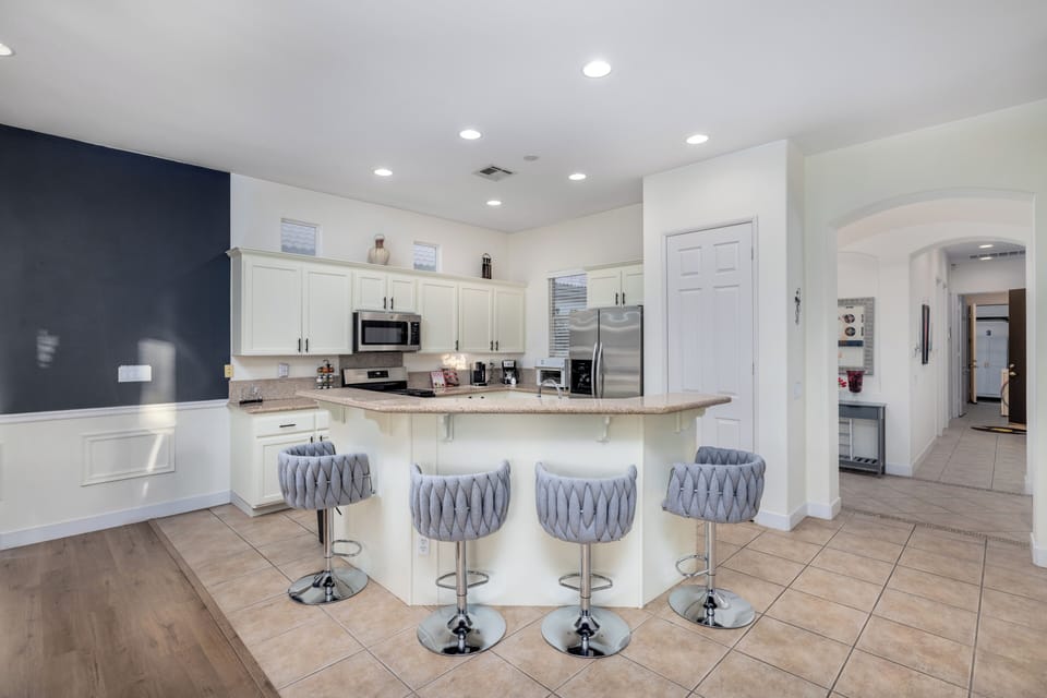 Four stylish swivel stools perfect for the kitchen island.