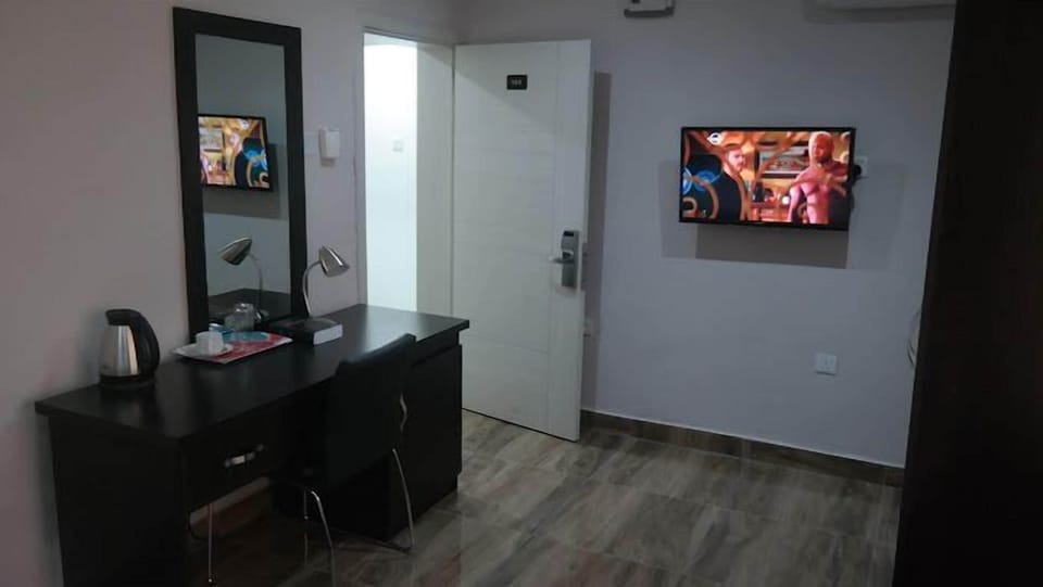 Family Apartment, Balcony, City View | 2 bedrooms, desk, laptop workspace, blackout drapes