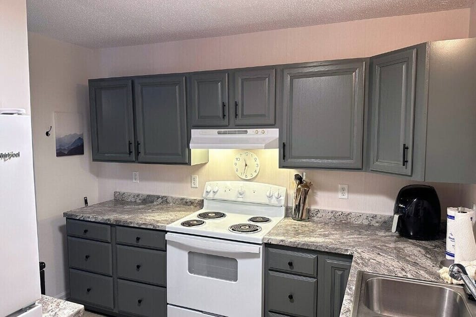appliances include a stove/oven, refrigerator, air fryer, coffee pot and keurig, dishwasher, and microwave!