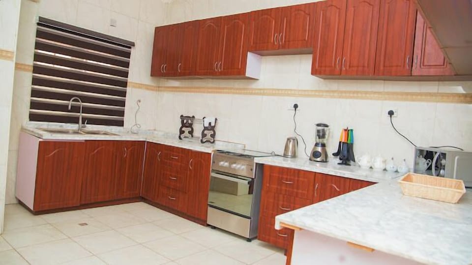 Economy Apartment, Balcony, City View | Private kitchen | Fridge, microwave, oven, stovetop