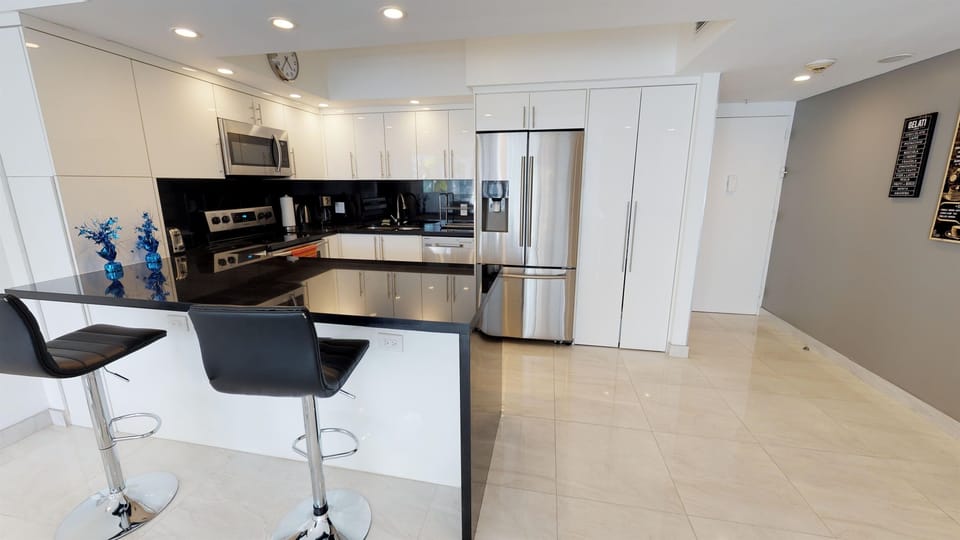Full Kitchen with laundry inside the apartment 