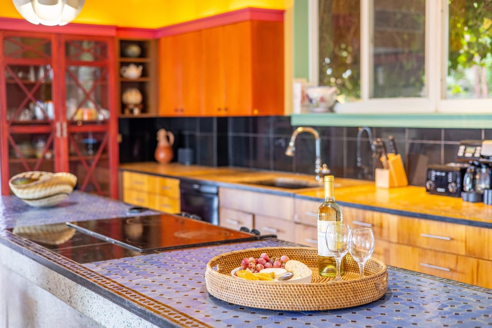 Enjoy a cold glass of wine in the gorgeous custom kitchen 