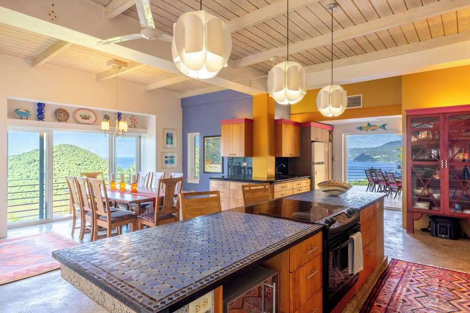 Large kitchen island with indoor dining area & outdoor dining area options