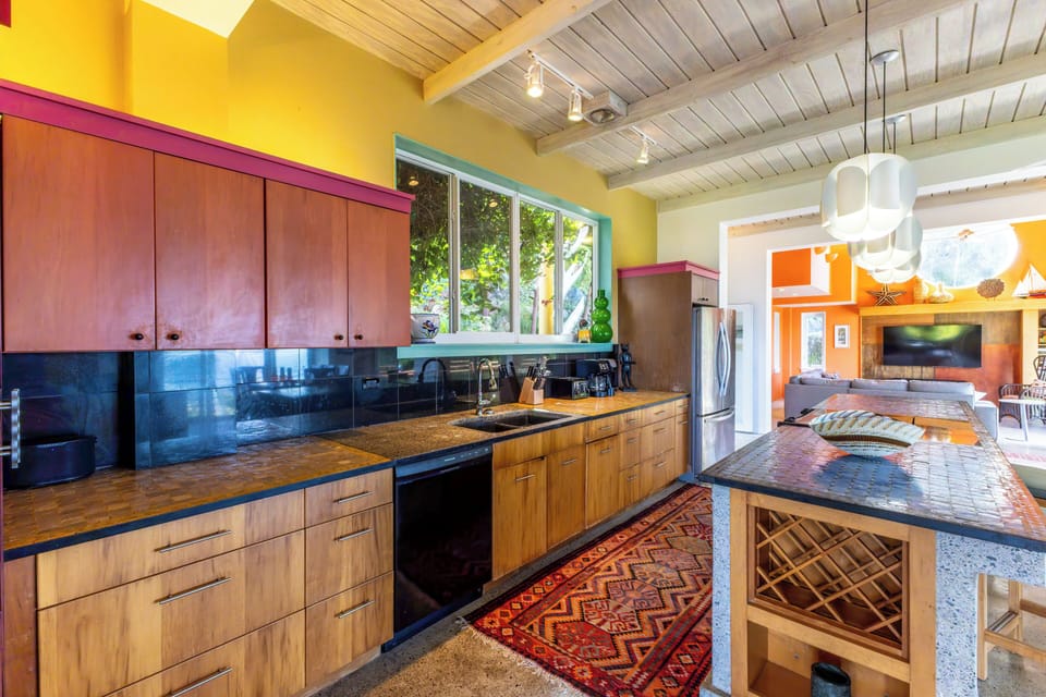 The kitchen is fully equipped for self catering & has a large central island