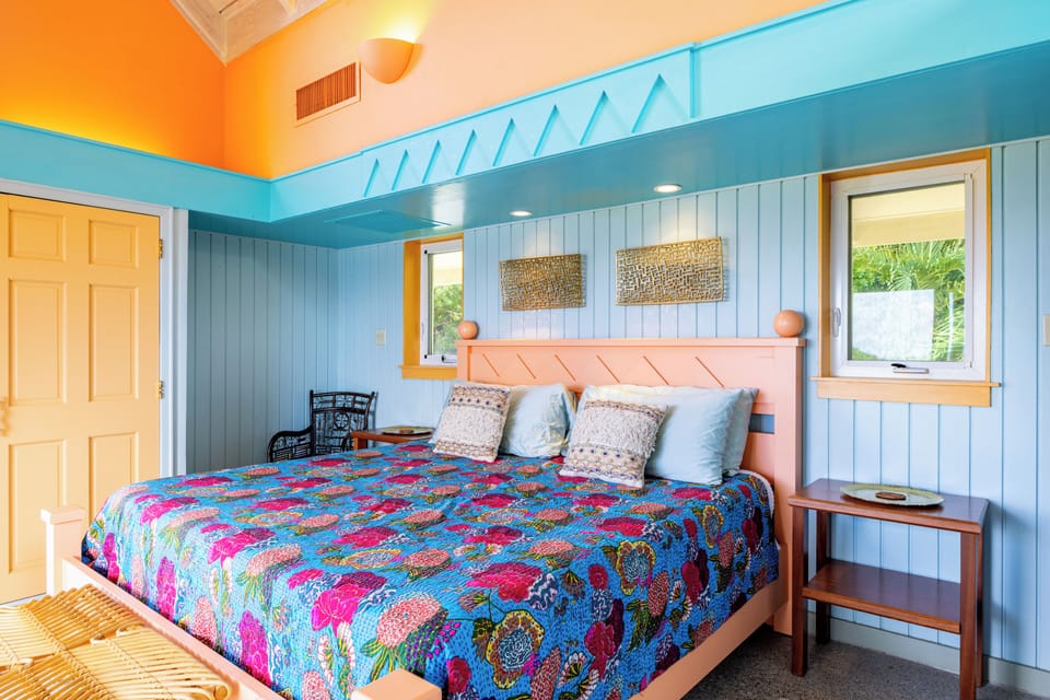 BEDROOM 3: Upstairs primary suite with king bed, ocean views & ensuite bathroom