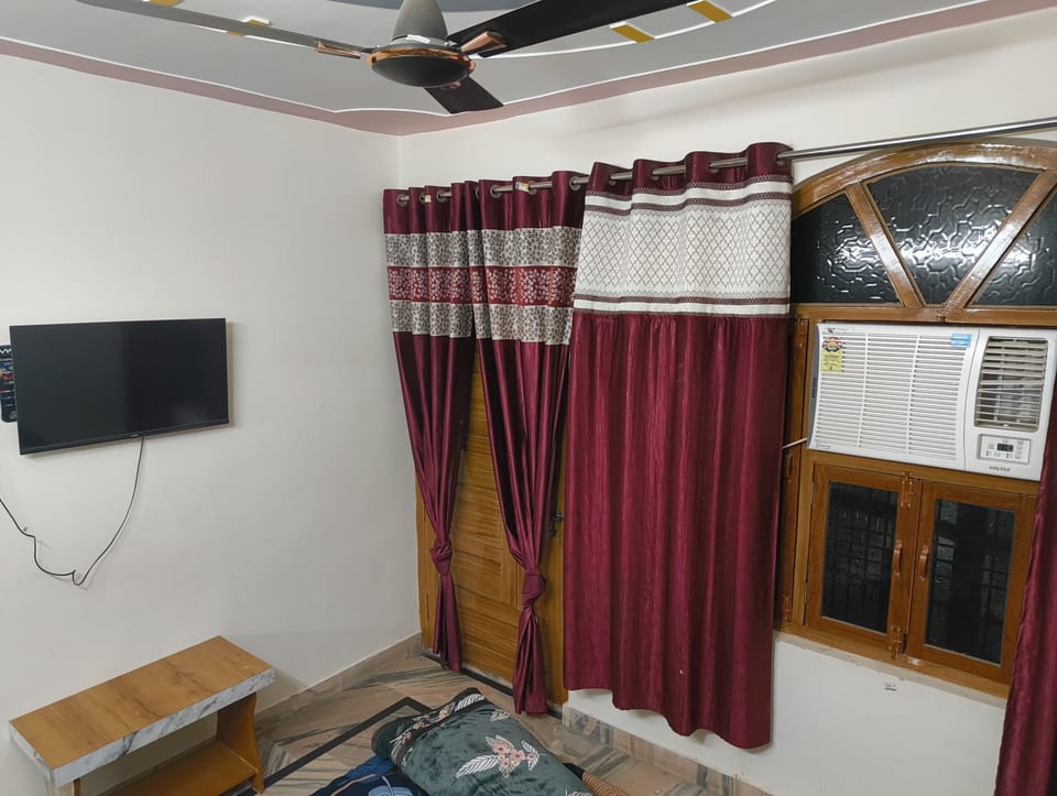 Family Suite, 2 Bedrooms, Connecting Rooms, City View | Television