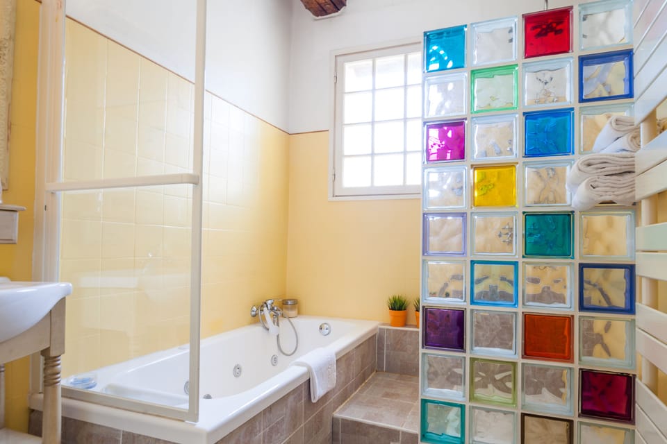 Suite | Bathroom | Hair dryer, bathrobes, towels