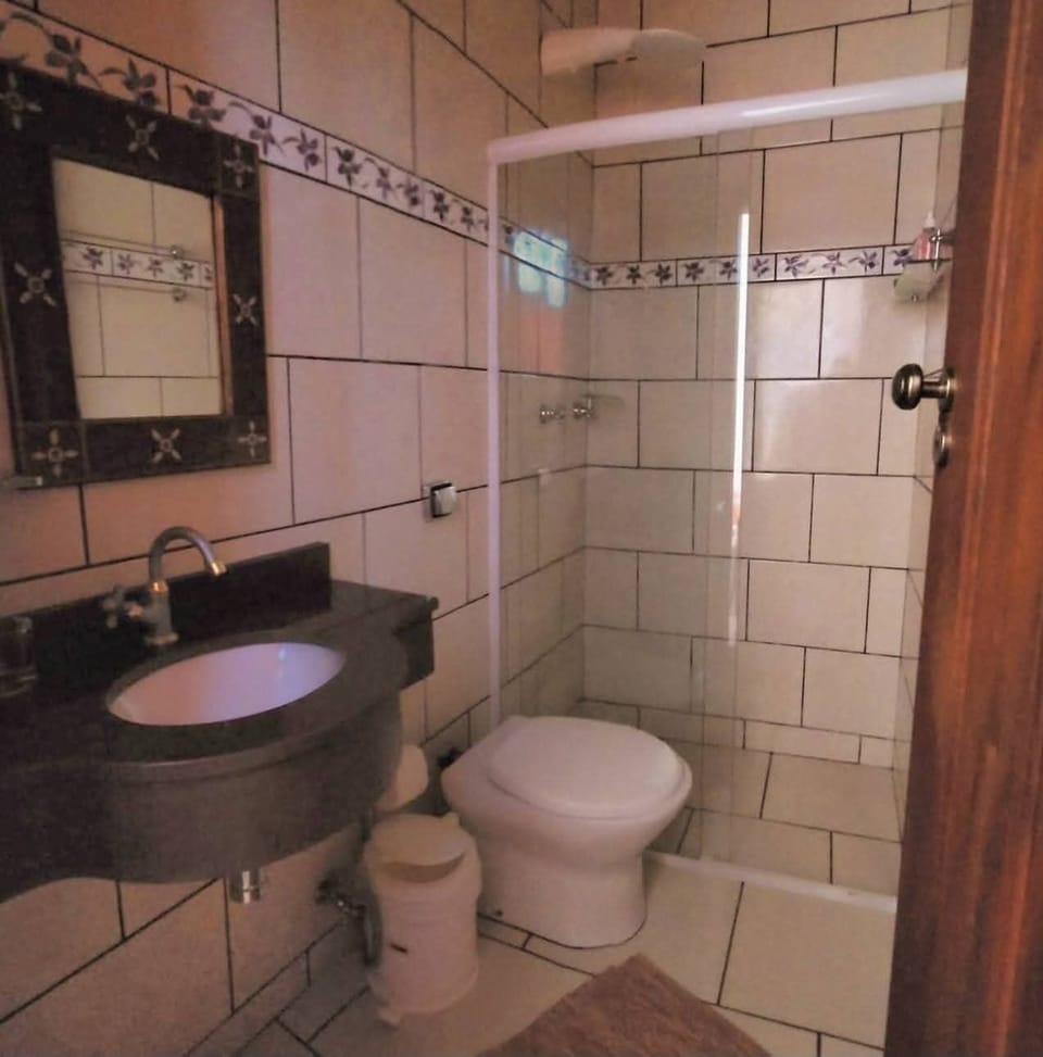 Shower, towels, soap, toilet paper
