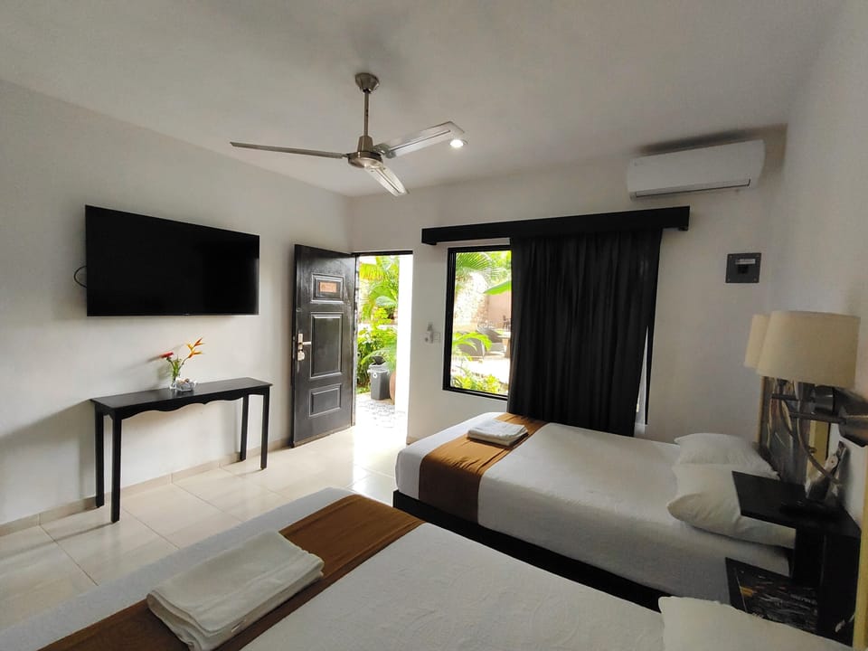 Comfort Quadruple Room, Patio, Garden View | Desk, free WiFi