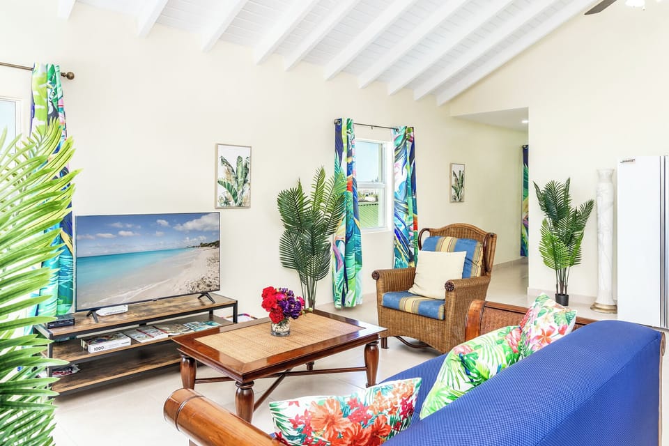 Apartment, 2 Bedrooms, Balcony, Lagoon View | Living area | Flat-screen TV