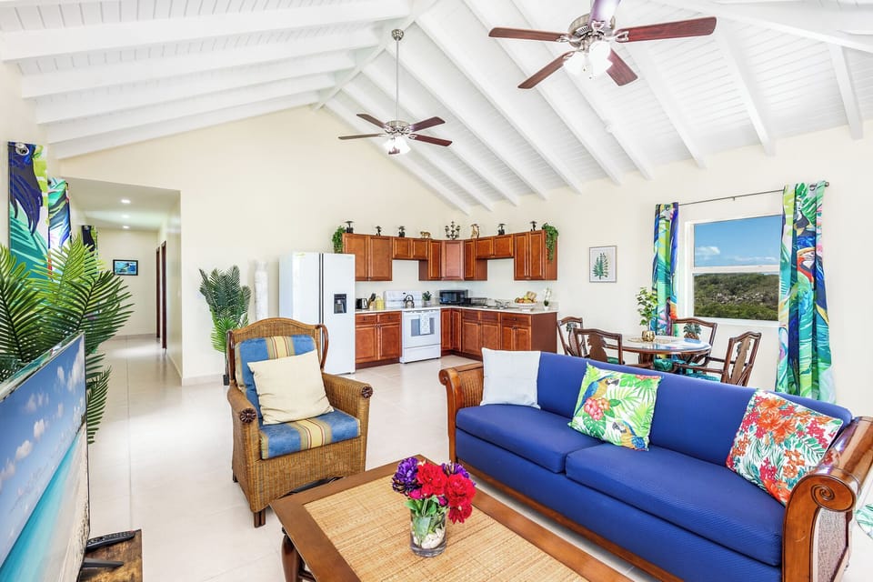 Apartment, 2 Bedrooms, Balcony, Lagoon View | Living area | Flat-screen TV