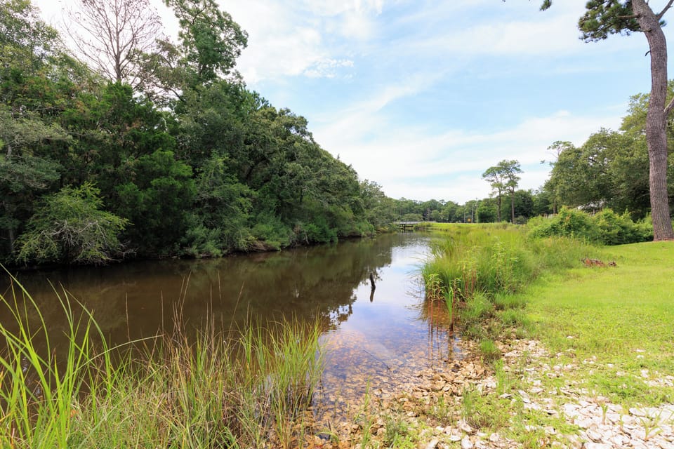 water views behind the home perfect for launching kayak or canoes 