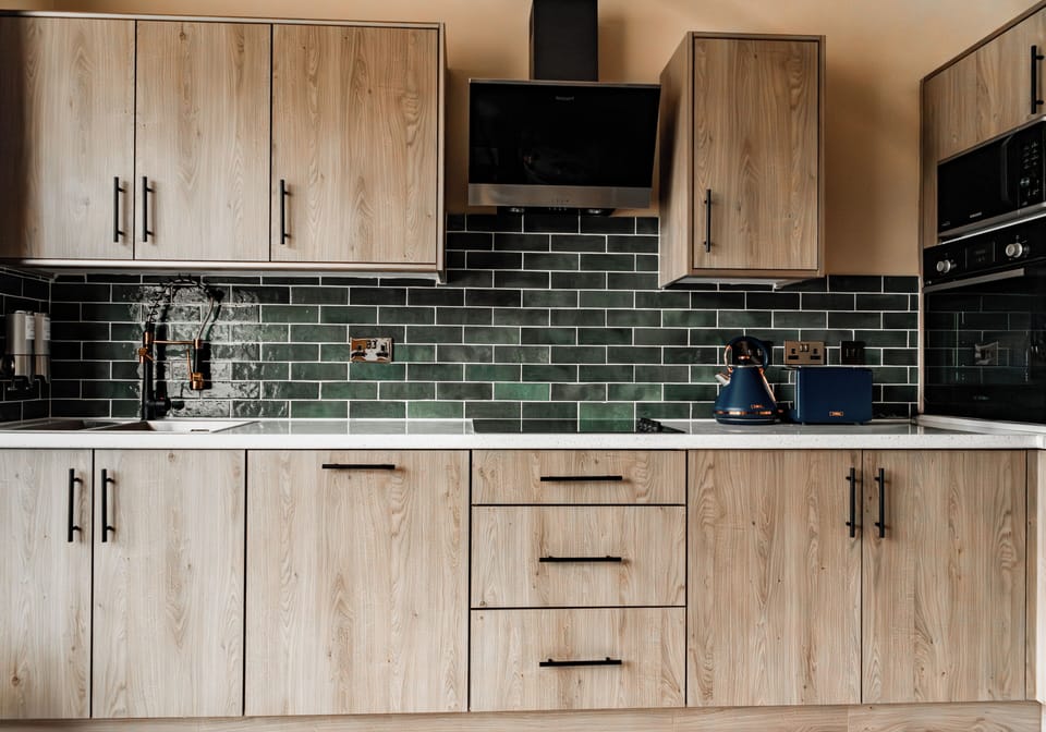 Suite, 1 Queen Bed, Private Bathroom, City View | Private kitchen | Full-size fridge, microwave, oven, stovetop