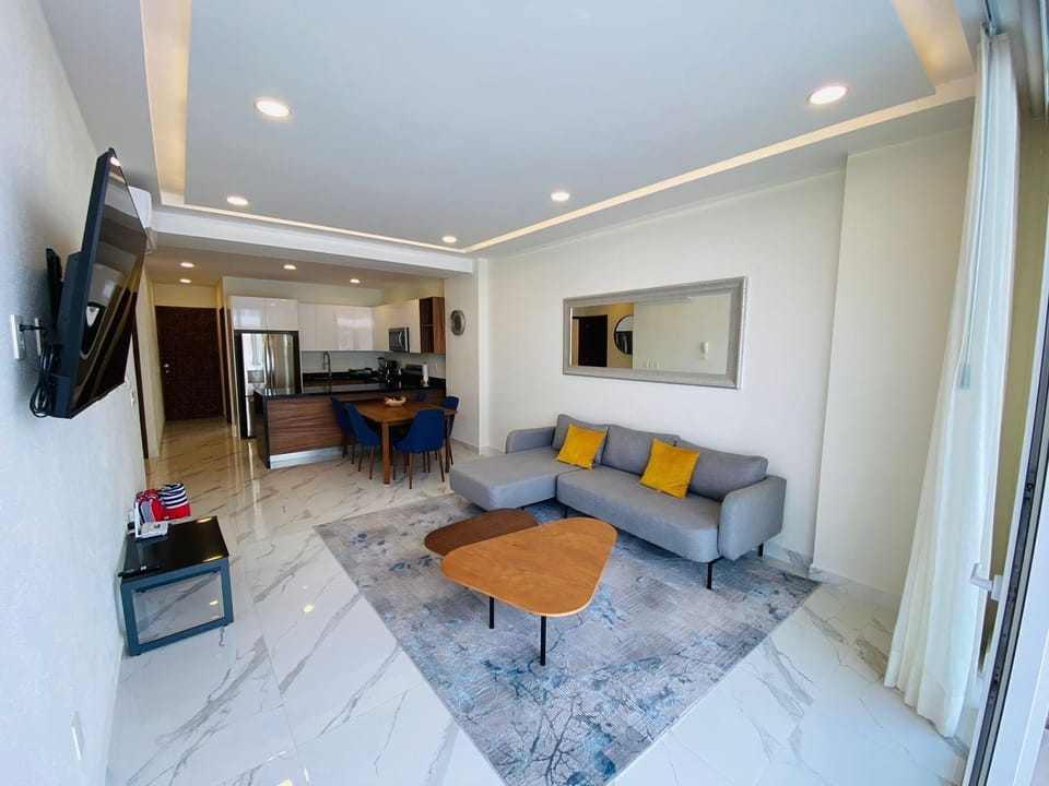Deluxe Apartment, Balcony, Pool View | Living area | Flat-screen TV