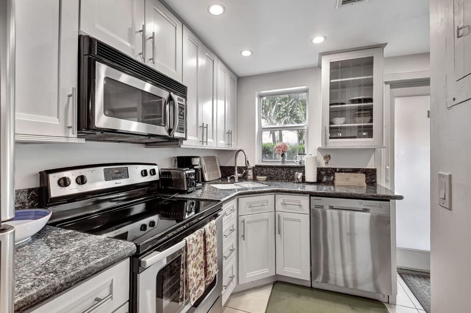 Cook, dine, and connect in this beautifully designed kitchen and dining space.