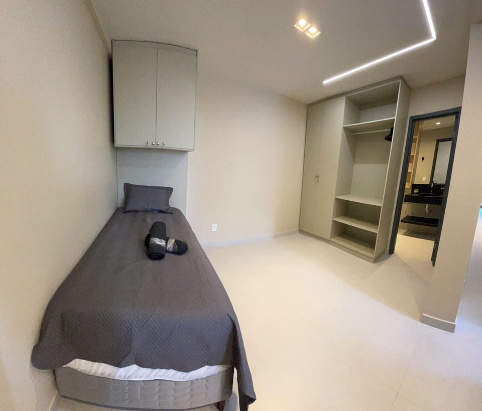 Apartment, Sea View | 3 bedrooms, laptop workspace, blackout drapes, iron/ironing board
