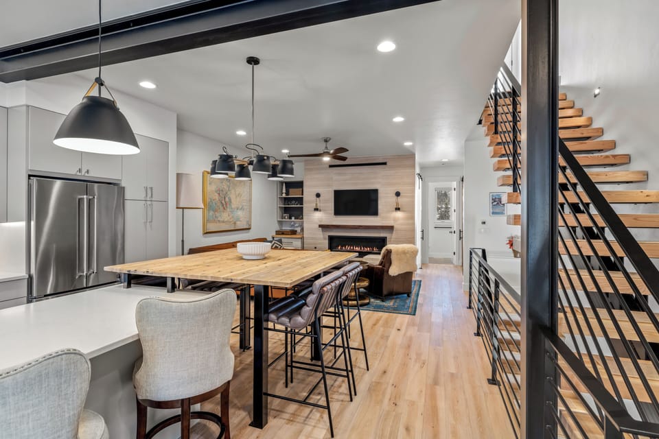 Raised island extension creates the dining space for all!