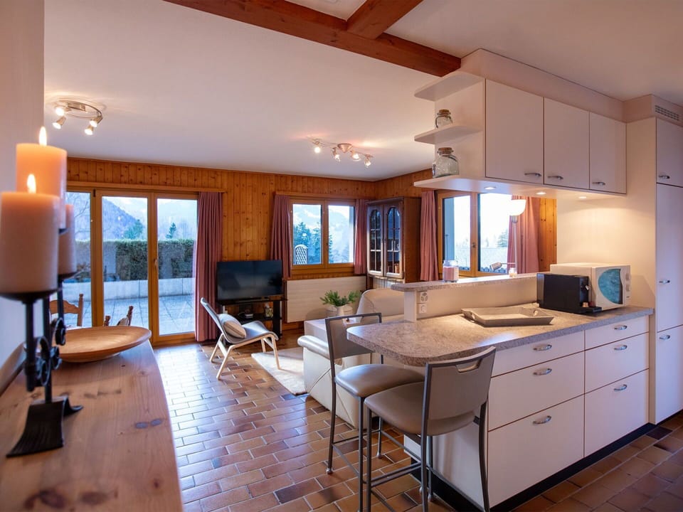 Furniture, Interior Design, Kitchen, Flooring, Countertop, Chair, Floor, Wood, Ceiling, Cabinetry