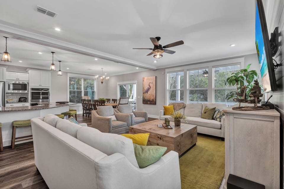 On the 1st floor, discover a sanctuary with a newly appointed kitchen featuring state-of-the-art appliances and ample pantry storage, perfect for entertaining a big group.