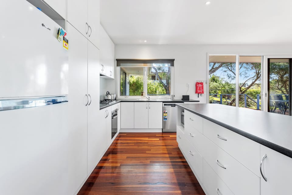 Whip up delicious dishes in our fully equipped, sleek kitchen