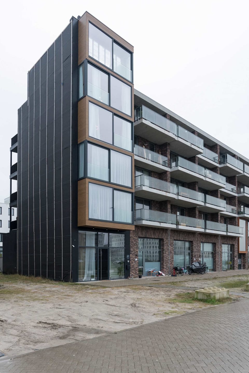 The outside view of the building in which the property is located - modern and stylish