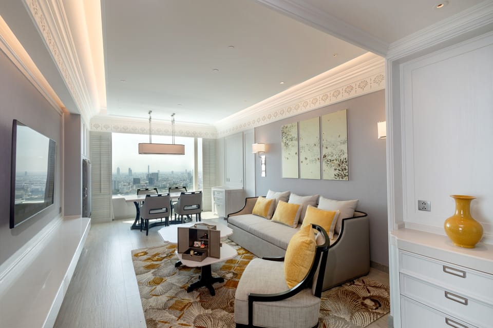 Family Executive Suite | Living area | 55-inch Smart TV with digital channels