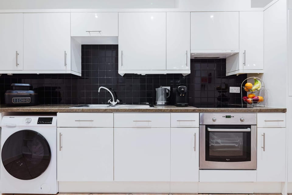 The kitchen is fully equipped to prepare a simple meal 
