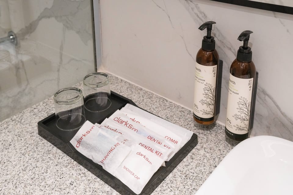 Deluxe Double or Twin Room | Bathroom | Shower, hair dryer, slippers, towels