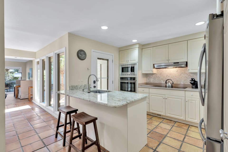 Stainless steel appliances and Keurig coffee maker.