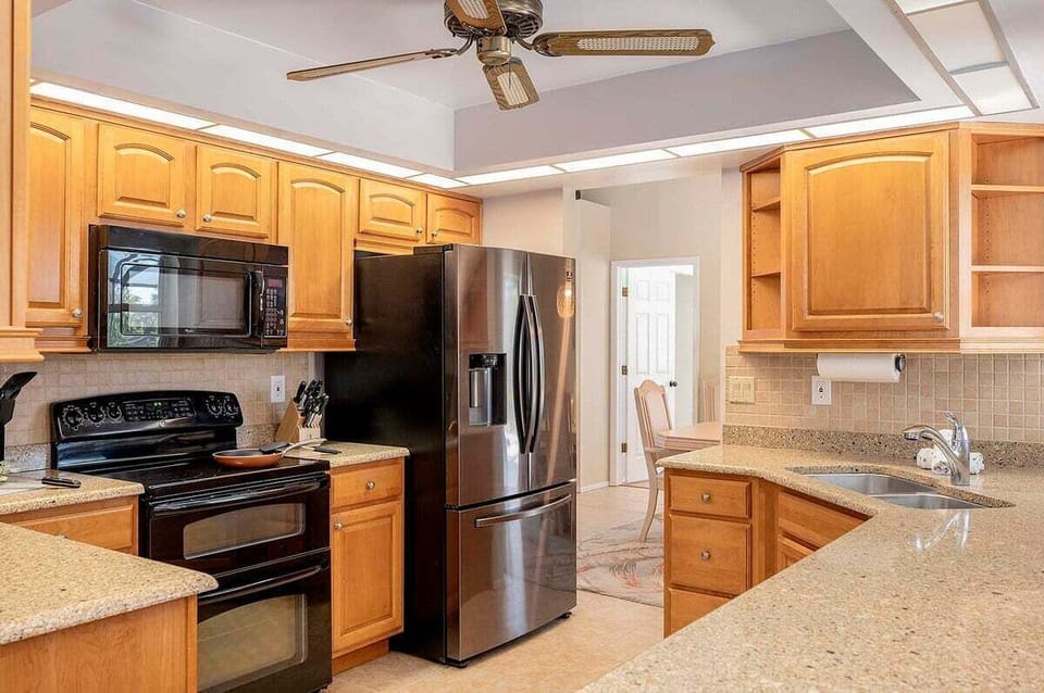 Kitchen with Double Oven and Stainless French Door Fridge