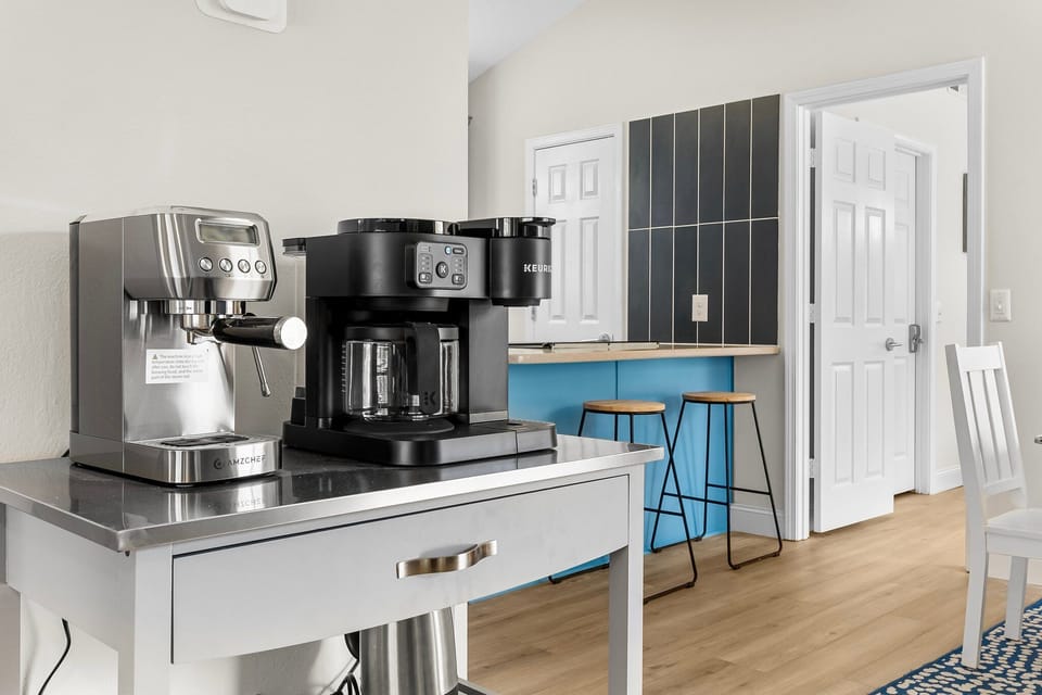 Start your morning at Sunsetora's coffee bar, featuring espresso and Keurig Duo