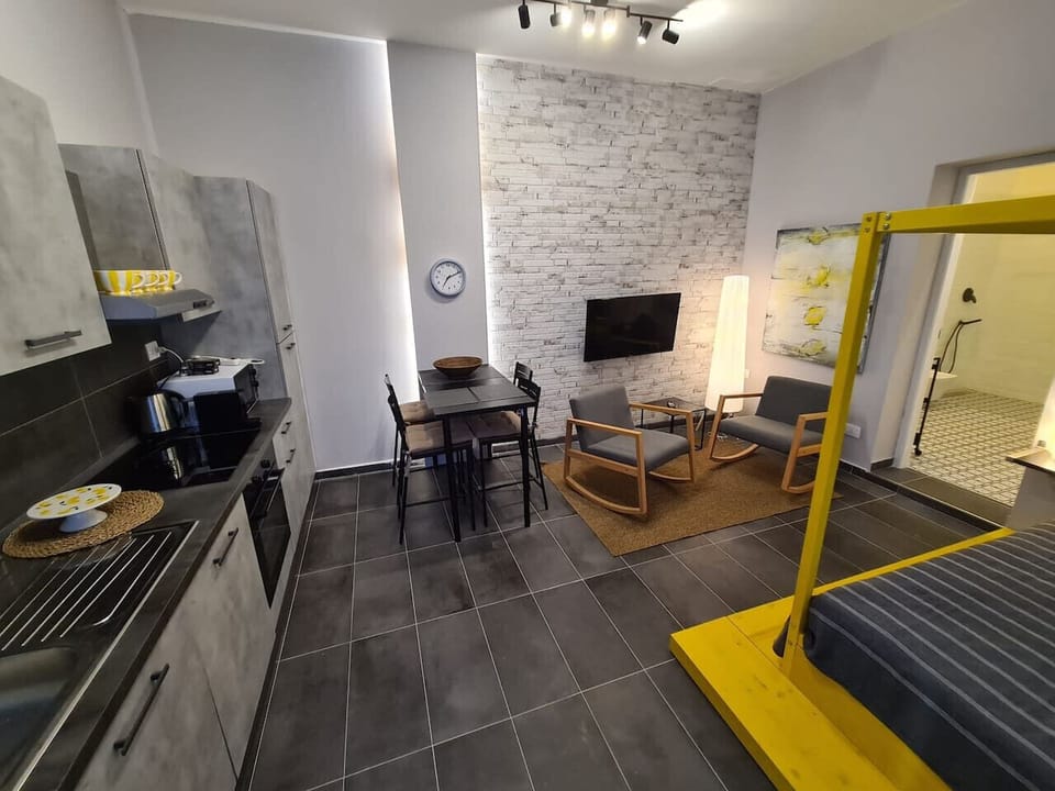 Rocking chair seating area in the living room and kitchen area