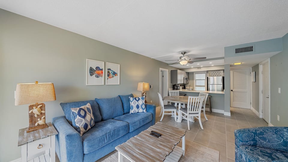 The beautifully decorated, open-concept living space welcomes you to your Longboat Key getaway, seamlessly blending plush coastal decor with the newly renovated kitchen.