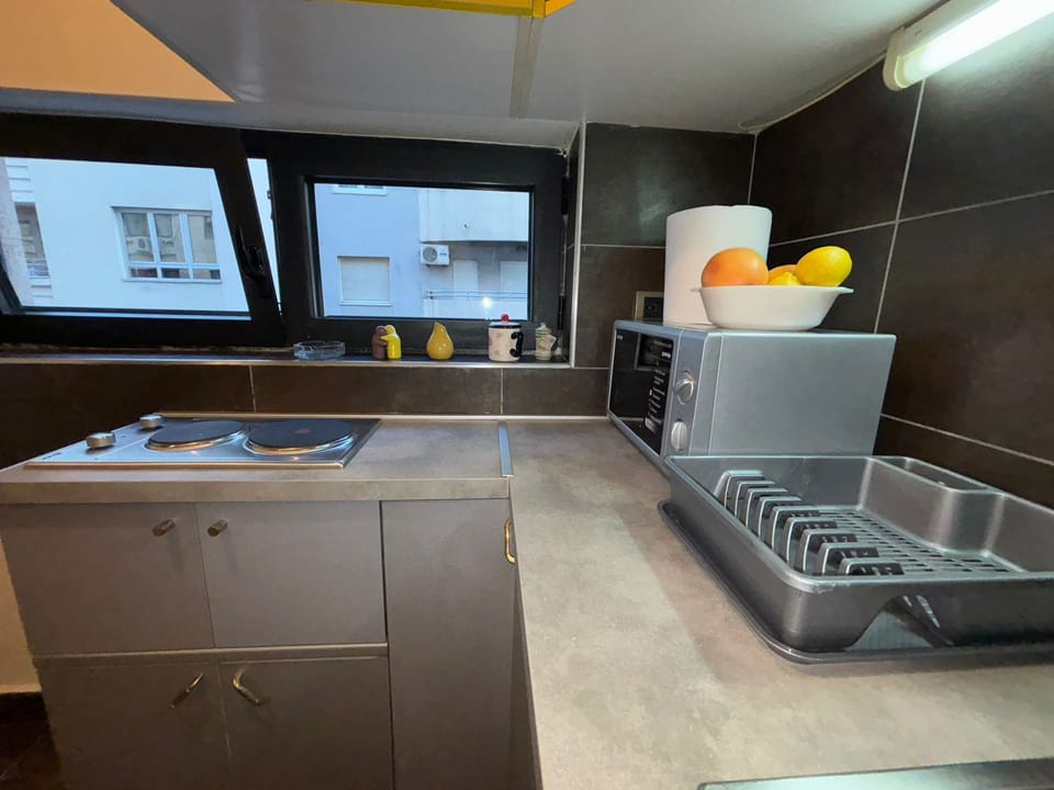 Standard Apartment, City View | Private kitchen | Espresso maker, coffee/tea maker, electric kettle