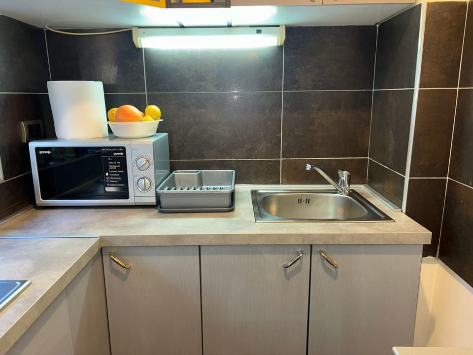 Standard Apartment, City View | Private kitchen | Espresso maker, coffee/tea maker, electric kettle