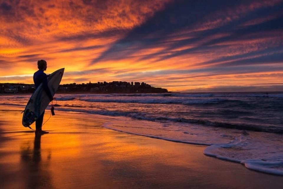 Catch the sunrise and watch local surfers take on Bondi’s early-morning waves.